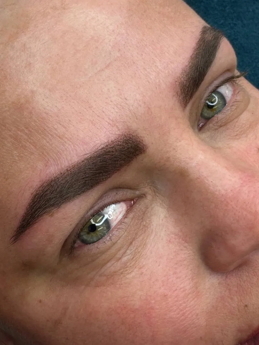 Permanent brow makeup — close-up of the brow arch
